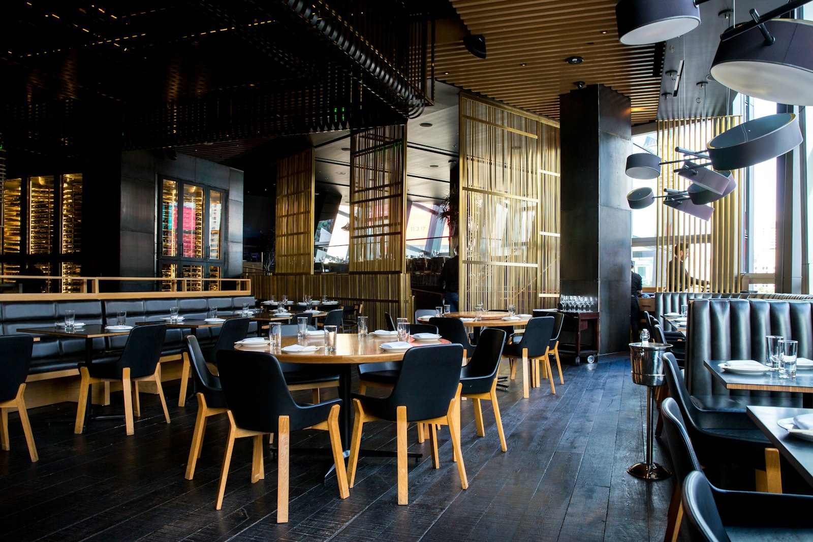Warm, intimate fine-dining room at Restaurant Deluxe