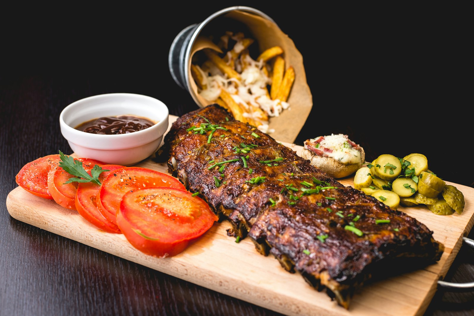 Chef-prepared signature platter in a candlelit dining room