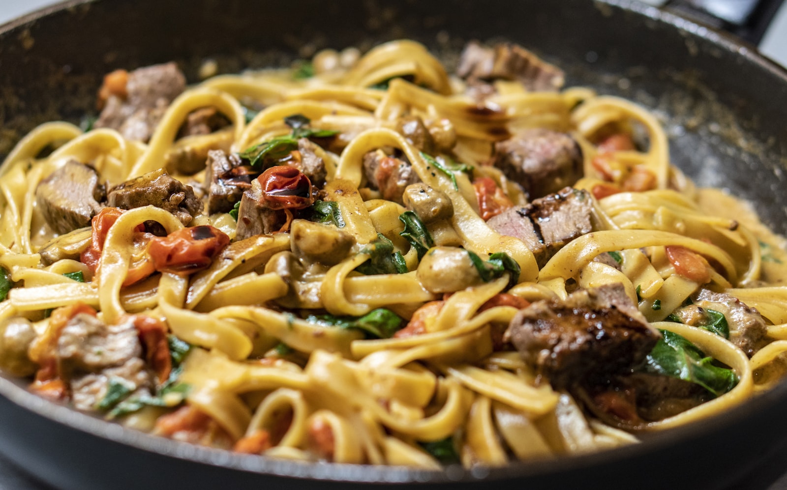 Creamy tagliatelle with seared beef and fresh herbs